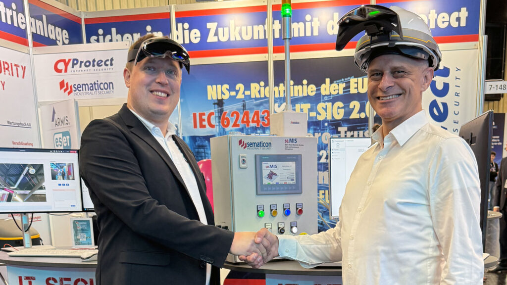 Michael Walser - Vorstand / CTO der sematicon AG und Andreas Fitting - CEO der AUNOVIS GmbH geben sich auf der it.sa die Hand